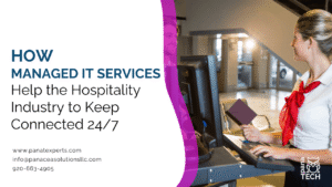 Hotel staff using a computer at the front desk